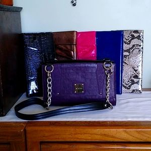 Handbag with exchangeable covers